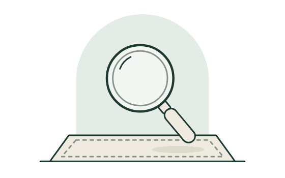 A loupe resting on an empty mat